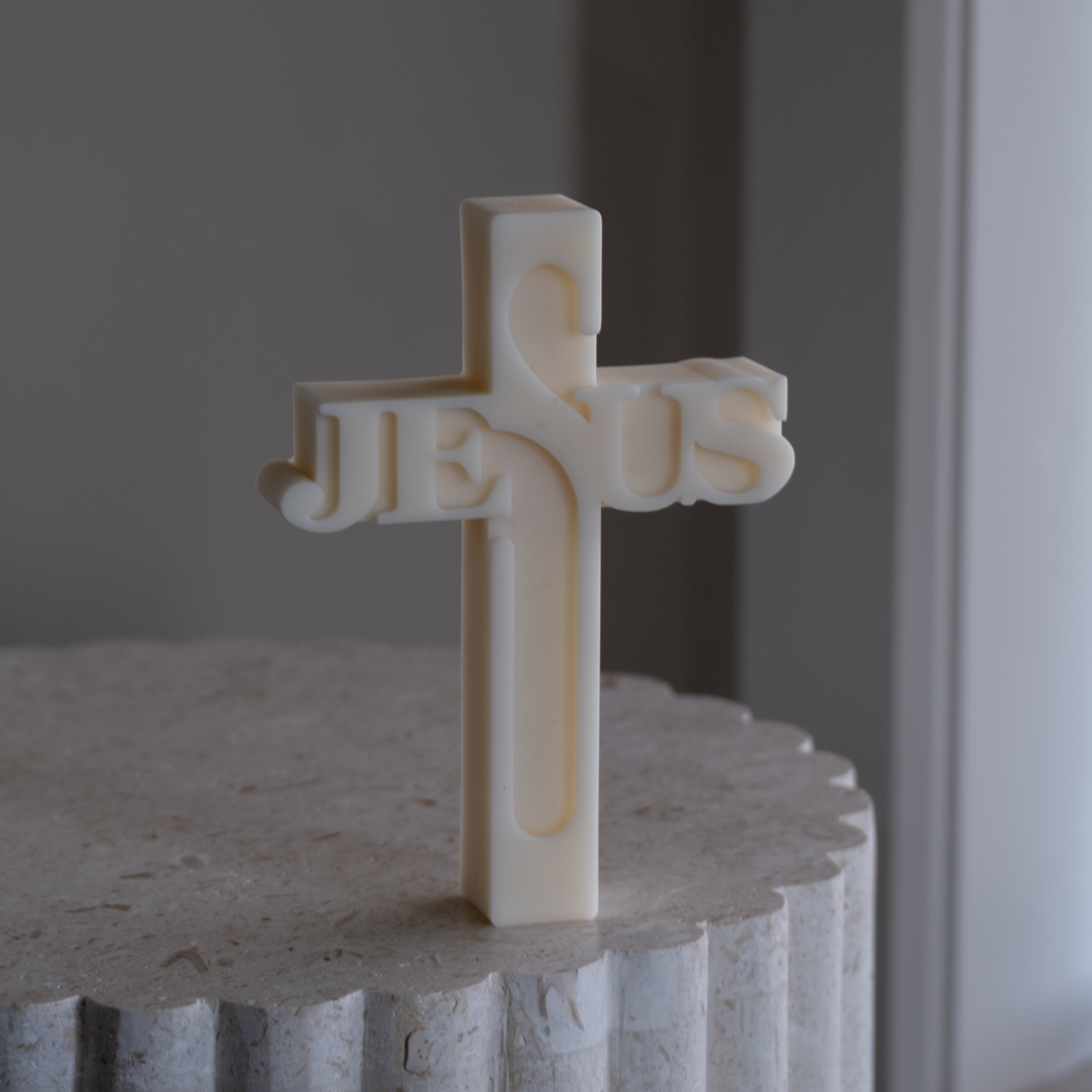 A premium Jesus Word Cross Silicone Candle Mould silicone candle mold by MYKA Candles and Moulds, a versatile tool for soap, resin, and cake mould crafting.