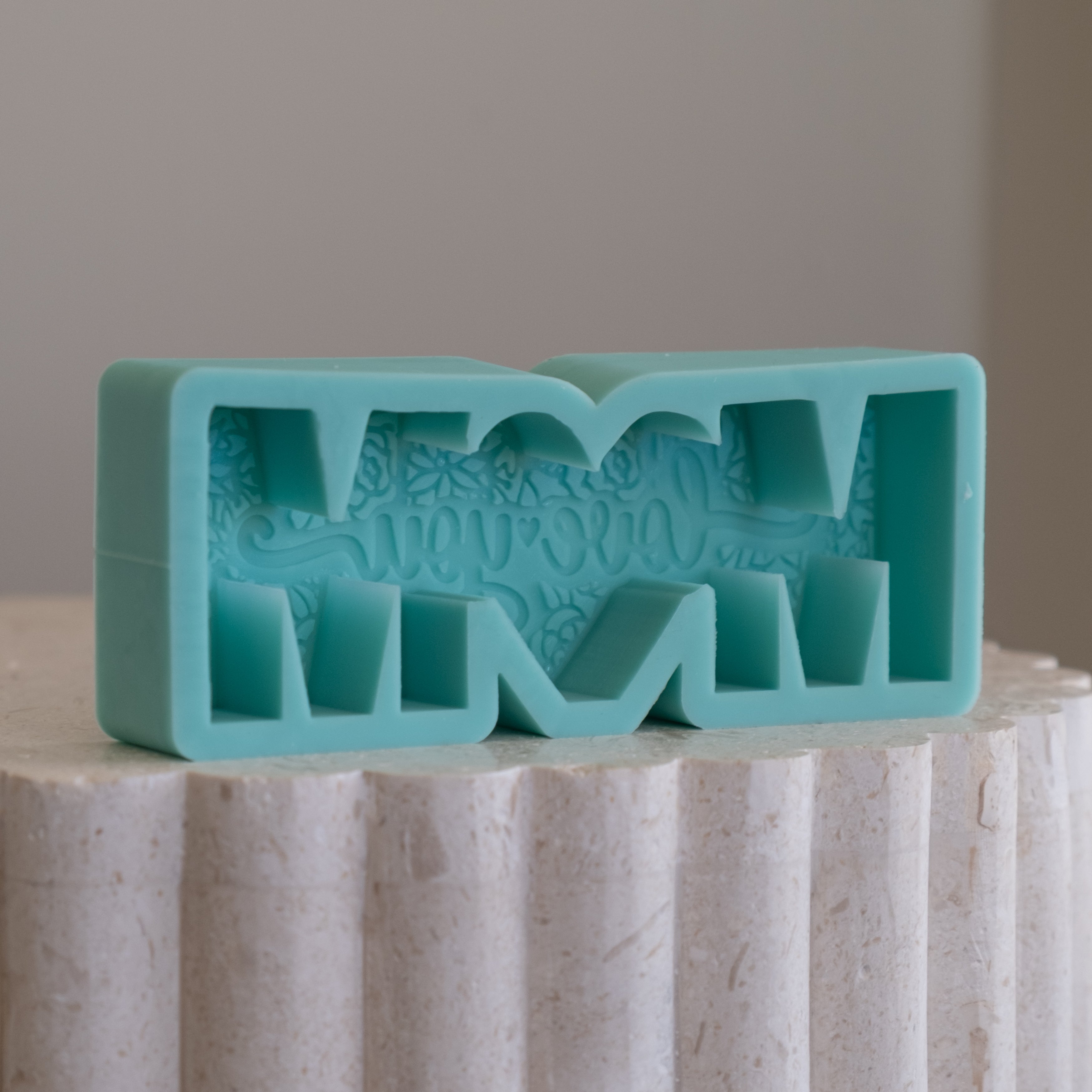 A heat-resistant Love You Mum Silicone Candle Mould silicone candle mould by MYKA Candles and Moulds, ideal for soap, resin, and baking mould applications.