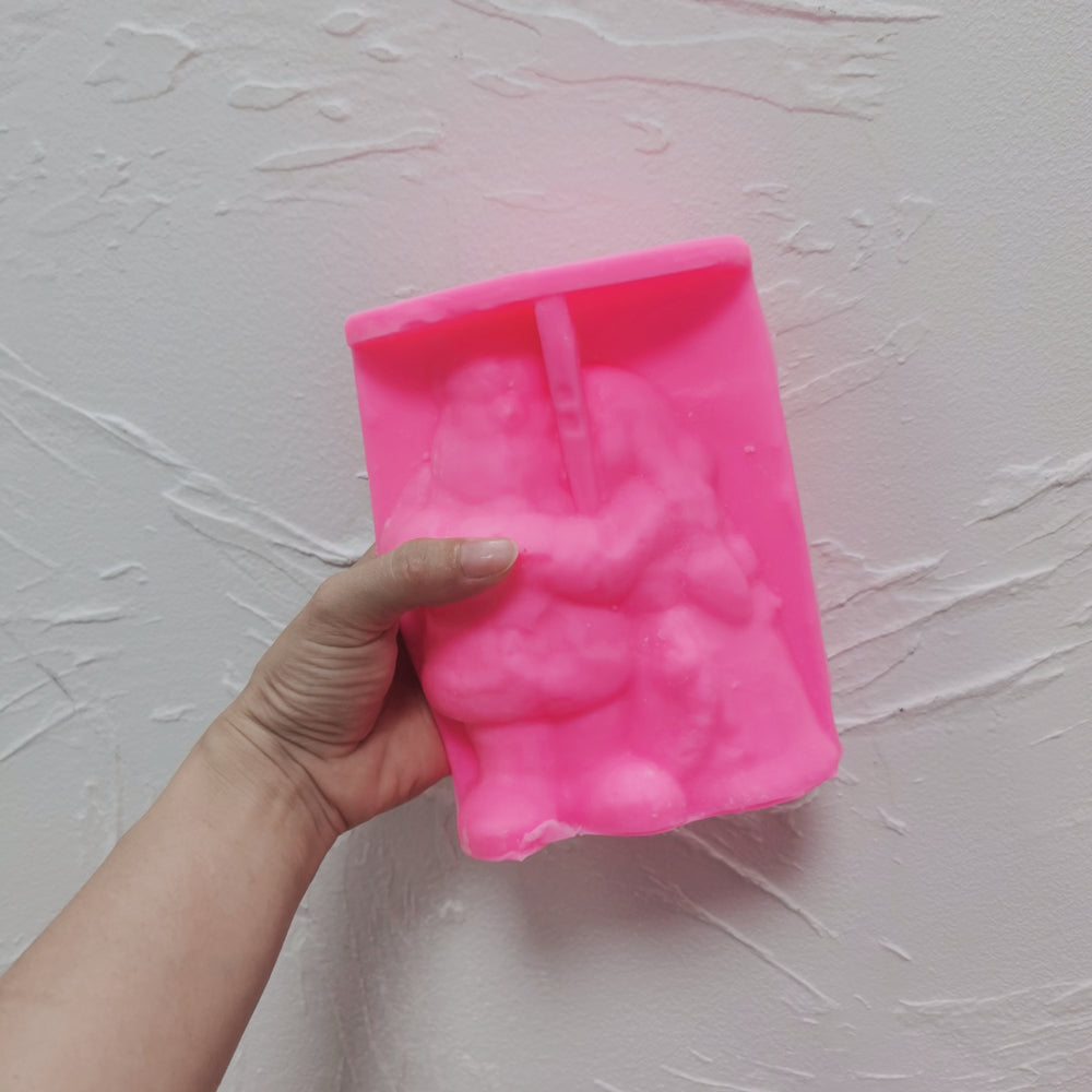 An aesthetic Mr. & Mrs. Claus Candle Mould silicone candle mould from MYKA Candles and Moulds, perfect for soap, resin, and cake mould art.