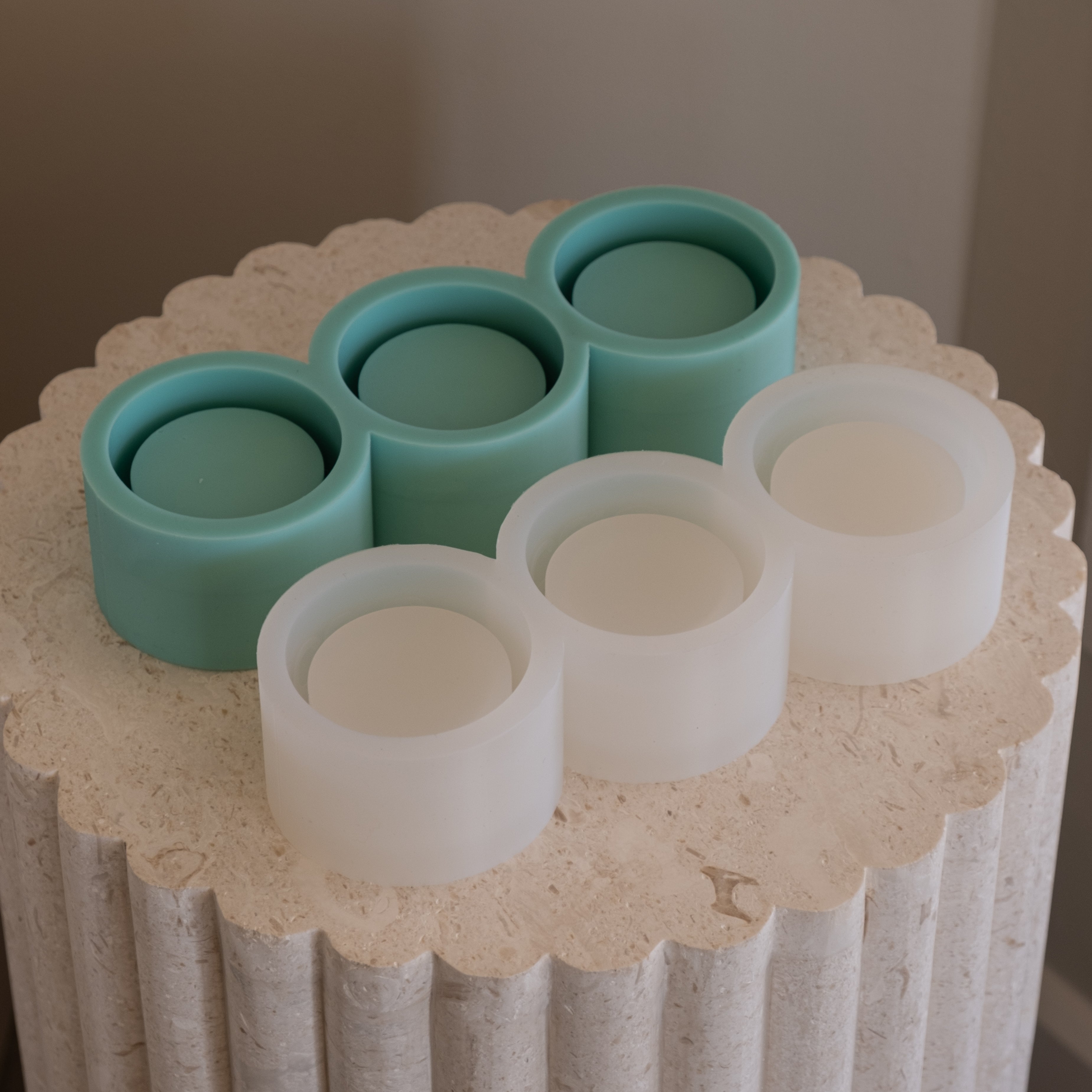 The Multi-Cavity Mini Jar Mould silicone candle mold by MYKA Candles and Moulds, featuring high detail for cement and plaster vessel moulds.