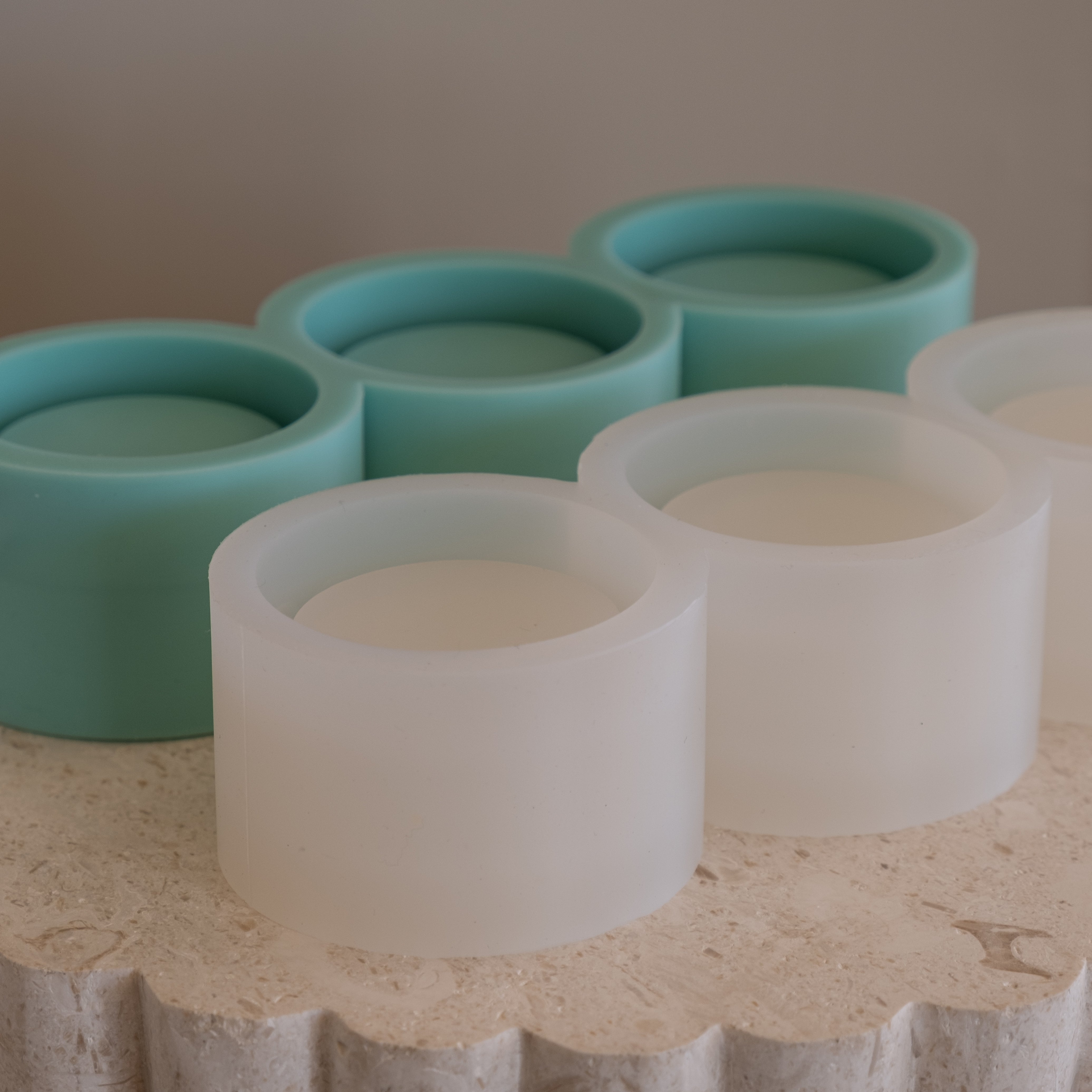 Close-up of the Multi-Cavity Mini Jar Mould silicone candle mould by MYKA Candles and Moulds for soy wax candles and concrete decor.