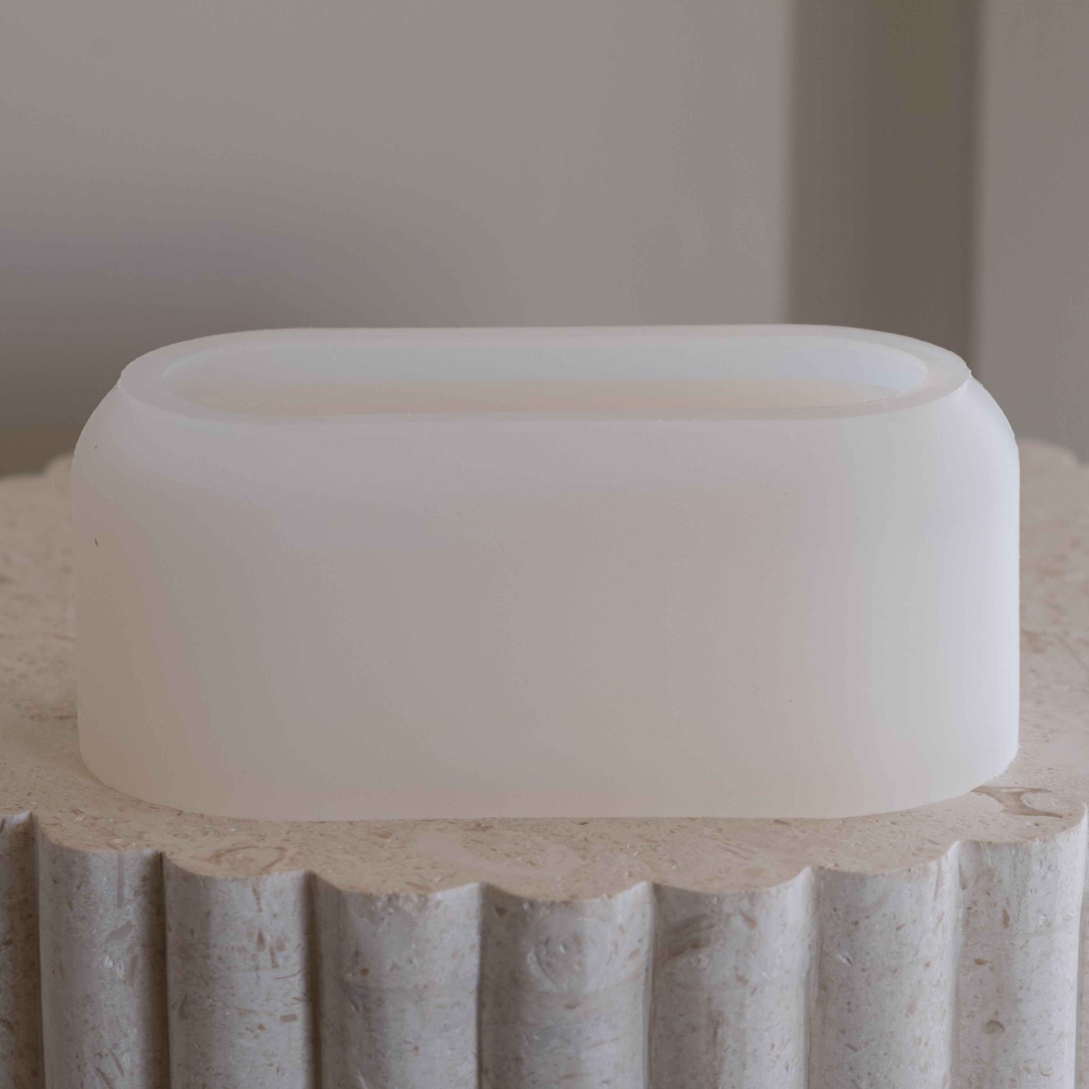 A versatile Oval Tulip Vessel Silicone Mould silicone candle mould by MYKA Candles and Moulds, suitable for resin jars and concrete planter moulds.