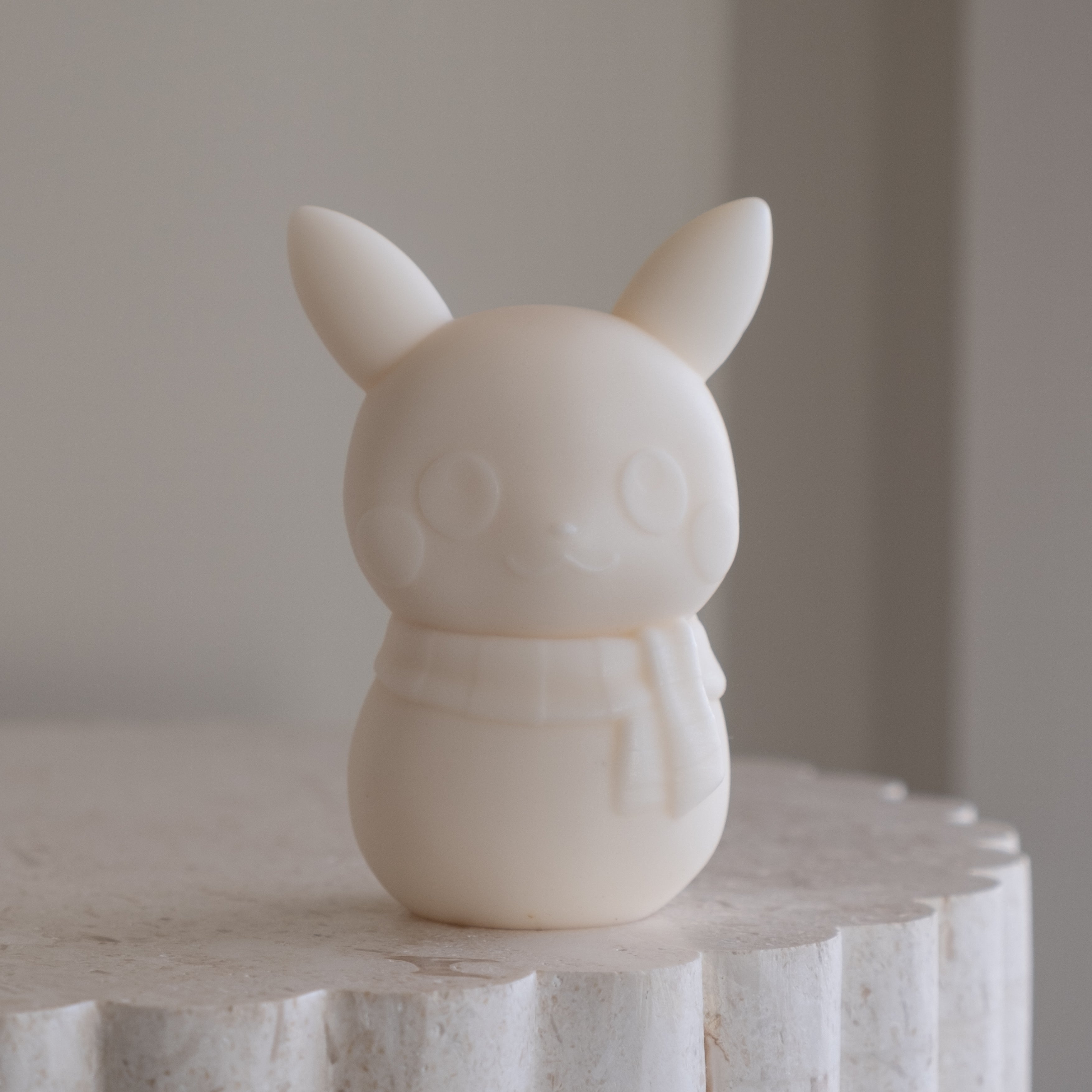 An aesthetic Pika Snowman Silicone Candle Mould silicone candle mould from MYKA Candles and Moulds, perfect for soap, resin, and cake mould art.