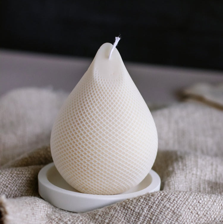 A premium Rain Drop Candle Mould silicone candle mold by MYKA Candles and Moulds, a versatile tool for soap, resin, and cake mould crafting.