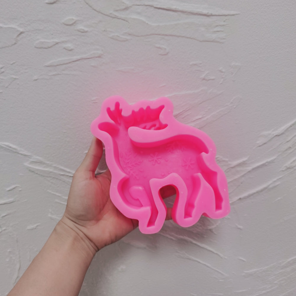 The flexible Reindeer Silicone Candle Mould silicone candle mould by MYKA Candles and Moulds, suitable for soap moulds and food-grade cake mould use.