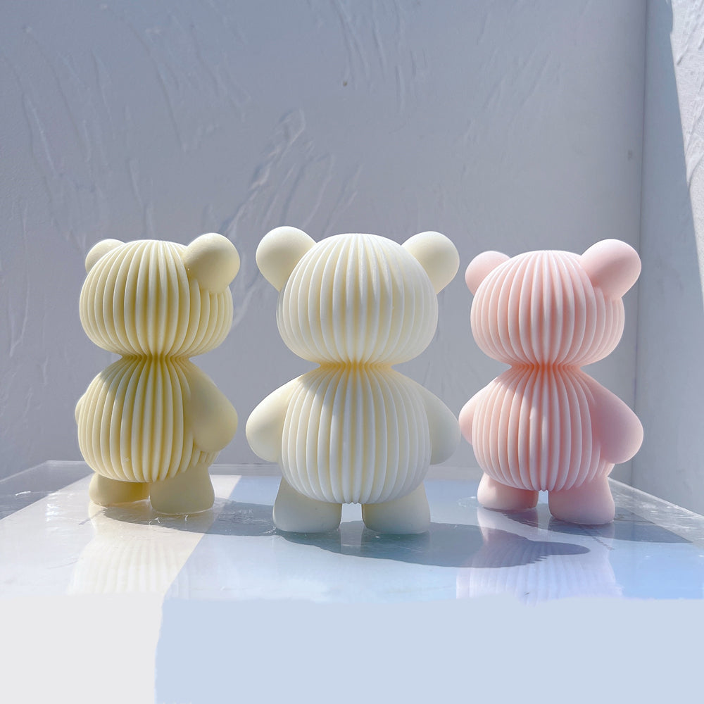 A heat-resistant Ribbed Bear Candle Mould silicone candle mould by MYKA Candles and Moulds, ideal for soap, resin, and baking mould applications.
