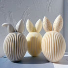 The flexible Ribbed Bunny Egg Candle Moulds silicone candle mould by MYKA Candles and Moulds, suitable for soap moulds and food-grade cake mould use.