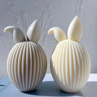 A Ribbed Bunny Egg Candle Moulds silicone candle mold by MYKA Candles and Moulds, designed for easy release in soap, resin, and cake mould casting.