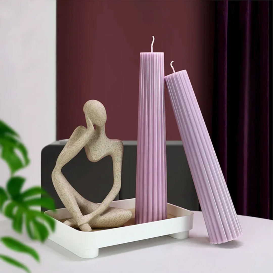 A premium Ribbed Column Candle Mould silicone candle mold by MYKA Candles and Moulds, a versatile tool for soap, resin, and cake mould crafting.