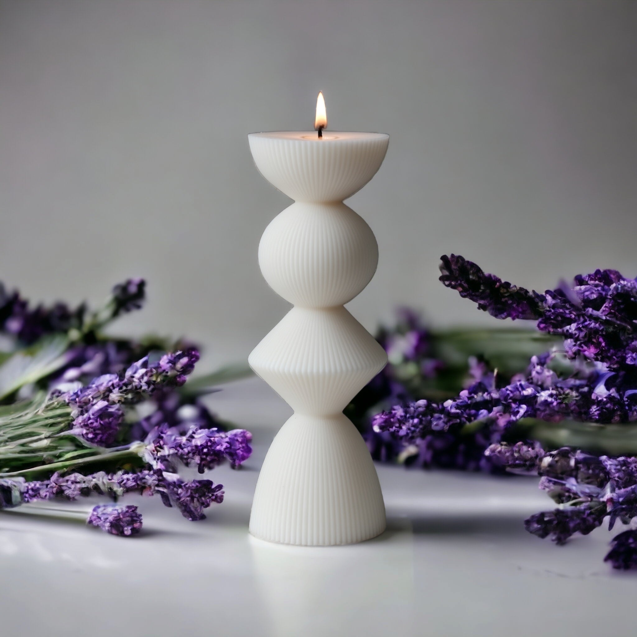 The Ribbed Geometric Pillar Candle Mould silicone candle mould from MYKA Candles and Moulds, a professional supply for candle, soap, and baking moulds.