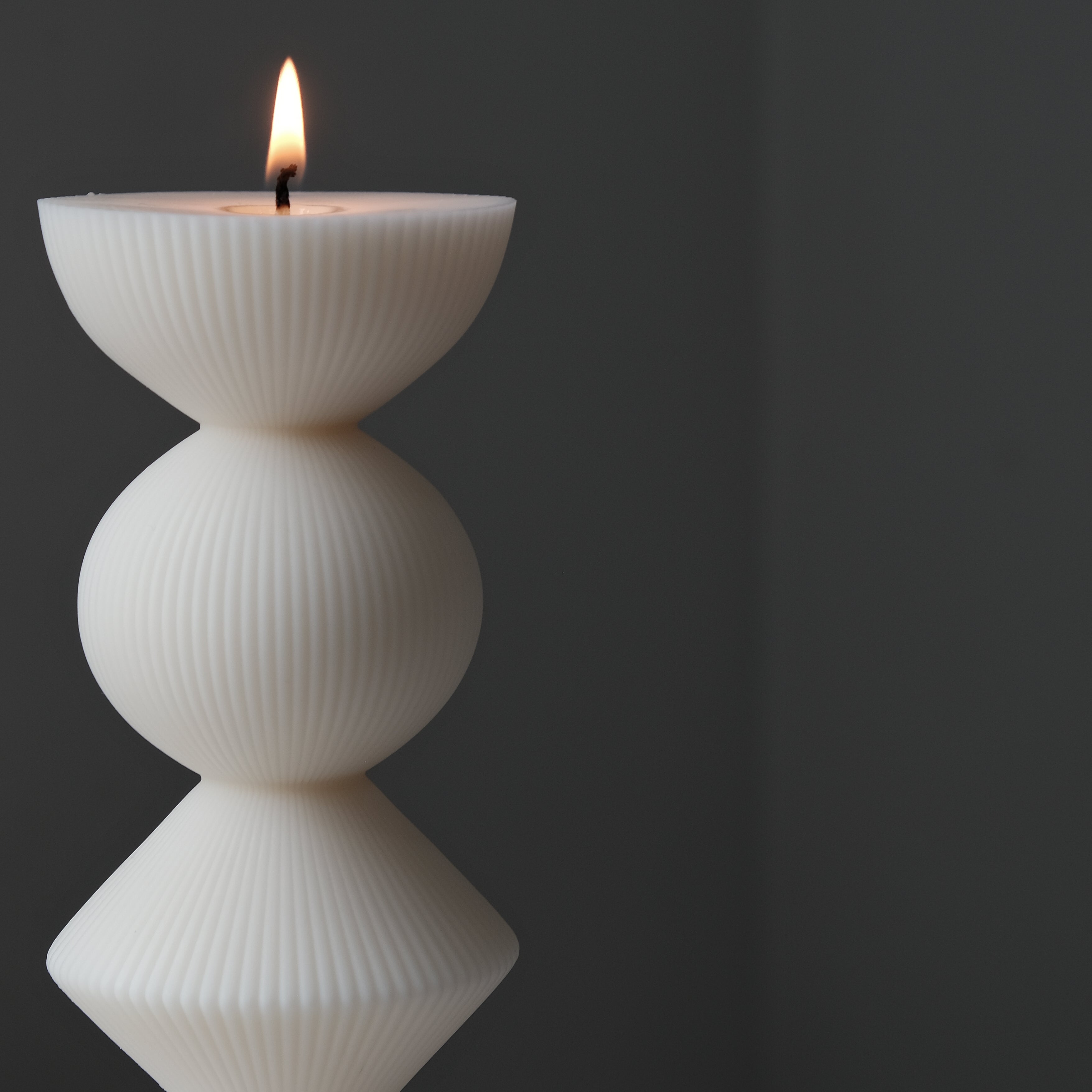 Handmade Ribbed Geometric Pillar Candle Mould silicone candle mold from MYKA Candles and Moulds, perfect for resin moulds and unique baking mould shapes.