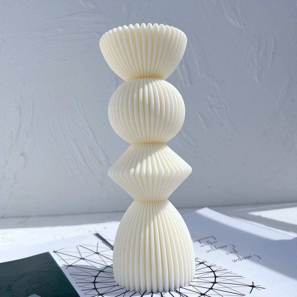 An aesthetic Ribbed Geometric Stack Candle Moulds silicone candle mould from MYKA Candles and Moulds, perfect for soap, resin, and cake mould art.