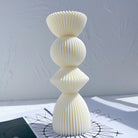 An aesthetic Ribbed Geometric Stack Candle Moulds silicone candle mould from MYKA Candles and Moulds, perfect for soap, resin, and cake mould art.