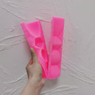 A Ribbed Geometric Stack Candle Moulds silicone candle mold by MYKA Candles and Moulds, the perfect multipurpose tool for soap, resin, and cake mould casting.