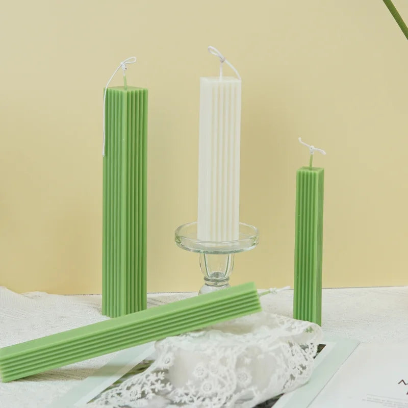 The Ribbed Rectangular Pillar Candle Moulds silicone candle mould by MYKA Candles and Moulds, a top choice for artistic resin moulds and baking moulds.