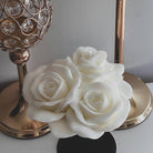 A heat-resistant Rose Trio Silicone Candle Mould silicone candle mould by MYKA Candles and Moulds, ideal for soap, resin, and baking mould applications.
