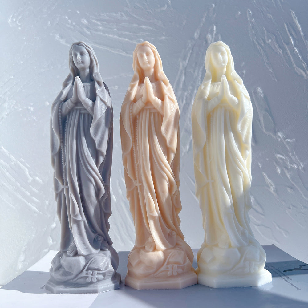 An aesthetic Saint Teresa of Avila Candle Mould silicone candle mould from MYKA Candles and Moulds, perfect for soap, resin, and cake mould art.