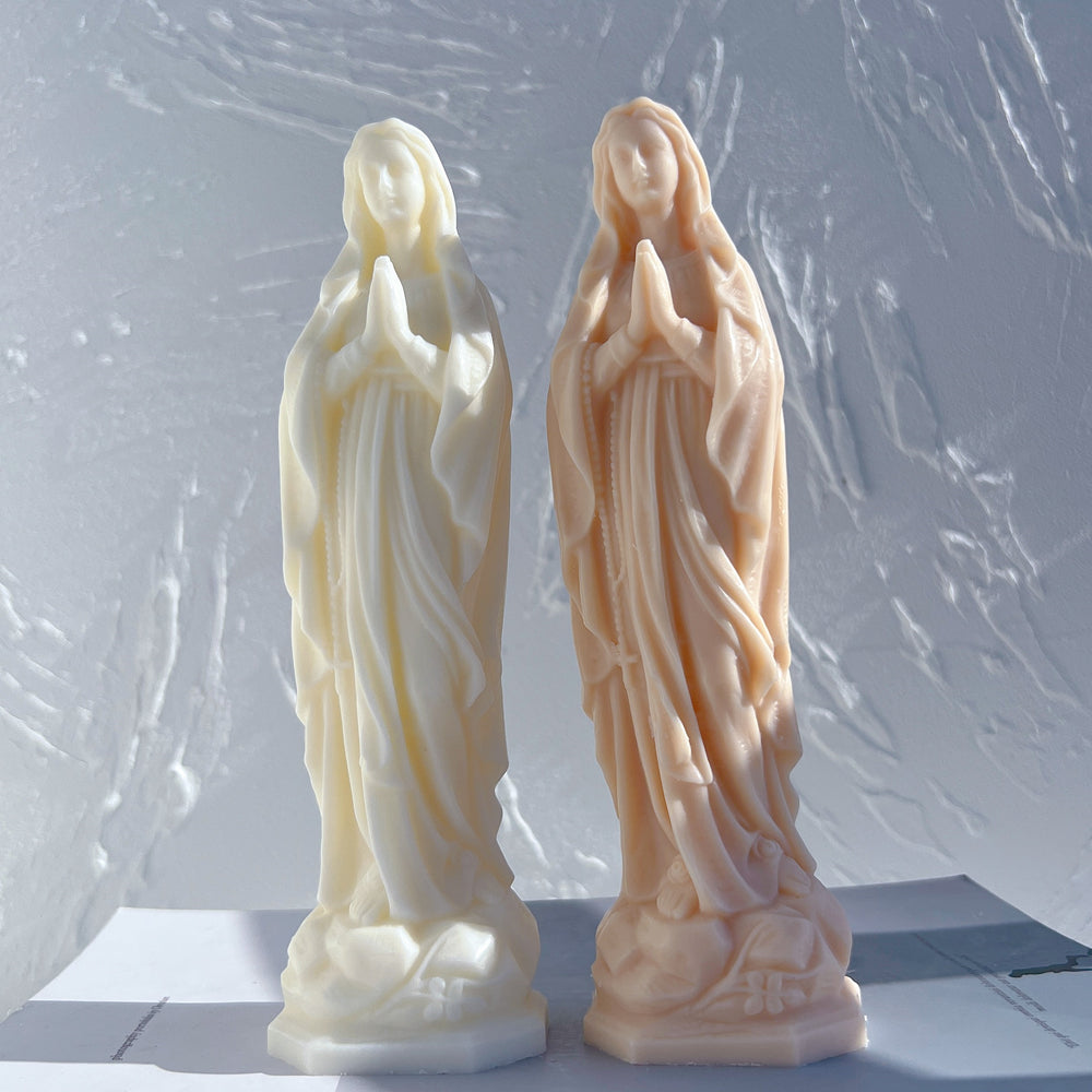 An aesthetic Saint Teresa of Avila Candle Mould silicone candle mould from MYKA Candles and Moulds, perfect for soap, resin, and cake mould art.