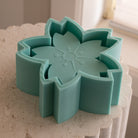 The flexible Sakura Vessel Mould silicone candle mould by MYKA Candles and Moulds, suitable for plaster casting and candle making.