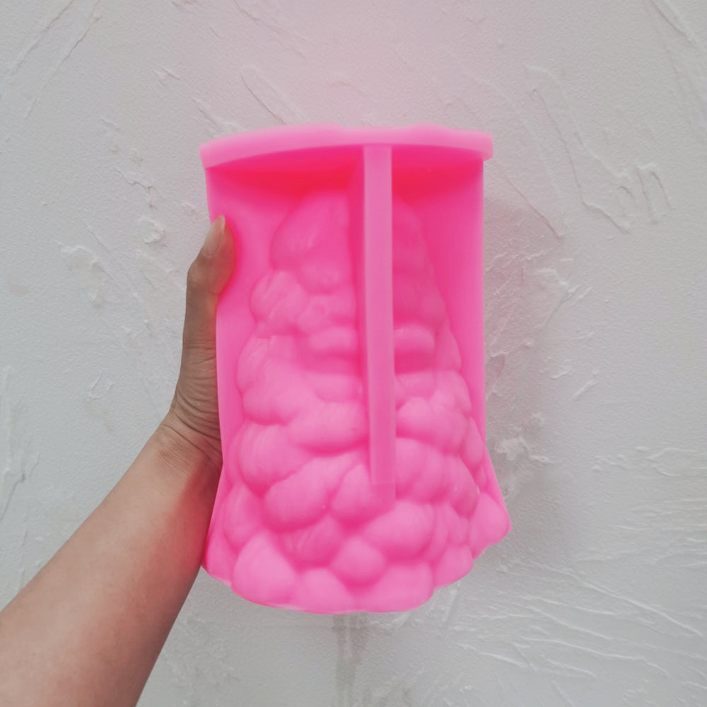 A Santa Christmas Tree Candle Mould silicone candle mold by MYKA Candles and Moulds, the perfect multipurpose tool for soap, resin, and cake mould casting.