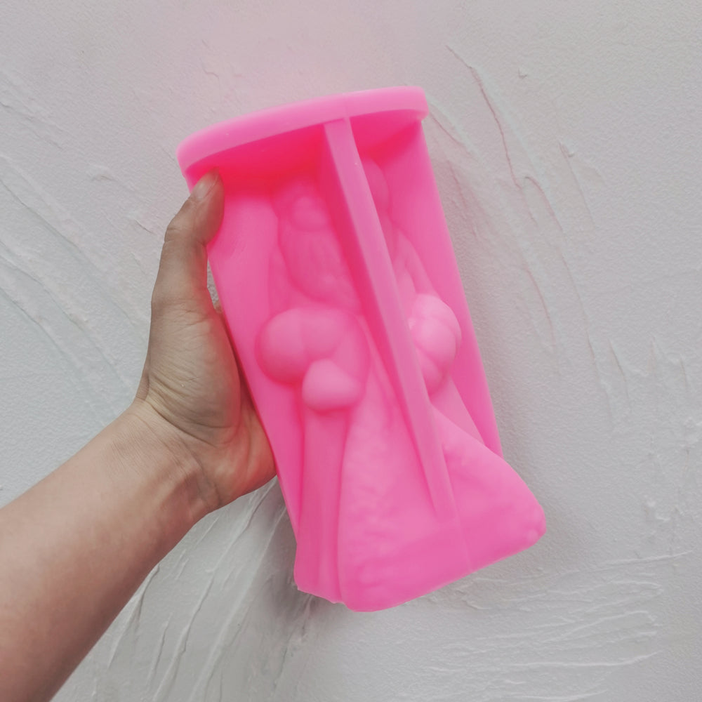 A heat-resistant Santa Claus Silicone Candle Mould silicone candle mould by MYKA Candles and Moulds, ideal for soap, resin, and baking mould applications.