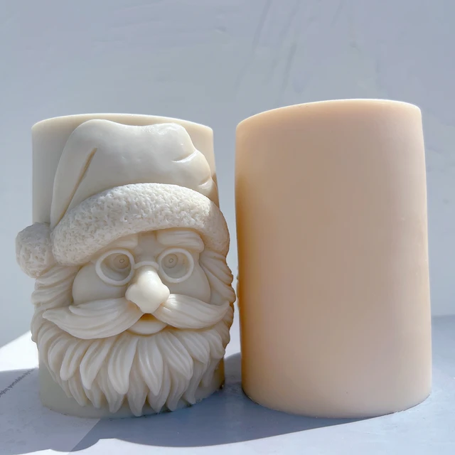 A detailed Santa Pillar Candle Mould silicone candle mould by MYKA Candles and Moulds, perfect for candle making, soap moulds, and resin moulds.