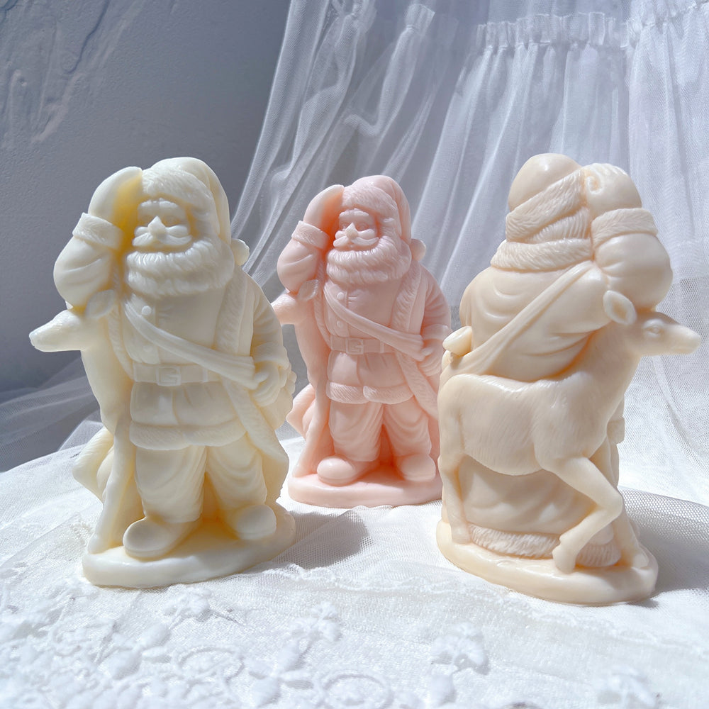 An aesthetic Santa and Rudolf Candle Mould silicone candle mould from MYKA Candles and Moulds, perfect for soap, resin, and cake mould art.