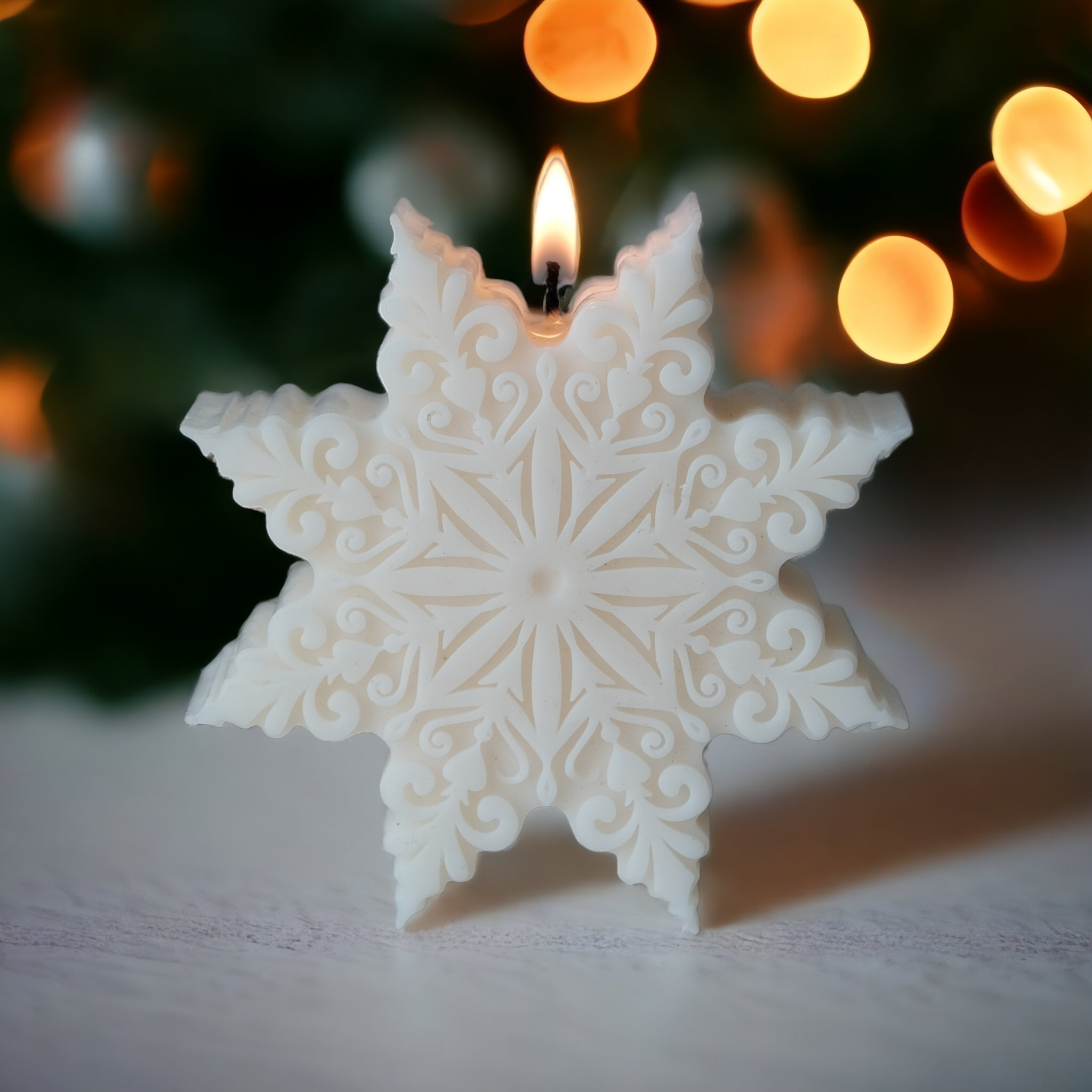 A heat-resistant Snowflake Silicone Candle Mould silicone candle mould by MYKA Candles and Moulds, ideal for soap, resin, and baking mould applications.