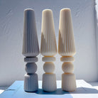 A premium Striped Vase Moulds silicone candle mold by MYKA Candles and Moulds, a versatile tool for cement and resin vessel moulds.