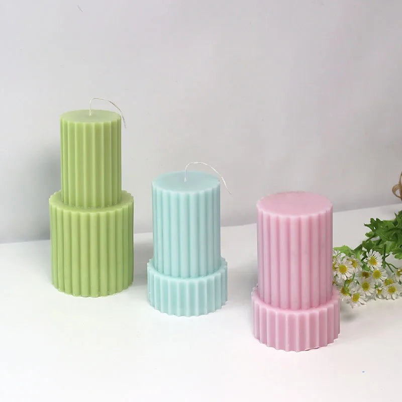 A heat-resistant Tiered Ribbed Pillar Candle Moulds silicone candle mould by MYKA Candles and Moulds, ideal for soap, resin, and baking mould applications.