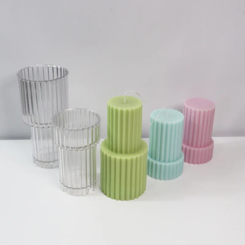A detailed Tiered Ribbed Pillar Candle Moulds silicone candle mould by MYKA Candles and Moulds, perfect for candle making, soap moulds, and resin moulds.