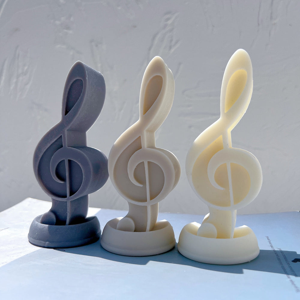 Showcasing the Treble Clef Music Note Candle Mould silicone candle mould by MYKA Candles and Moulds for creative baking moulds and candle making.