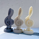 Showcasing the Treble Clef Music Note Candle Mould silicone candle mould by MYKA Candles and Moulds for creative baking moulds and candle making.