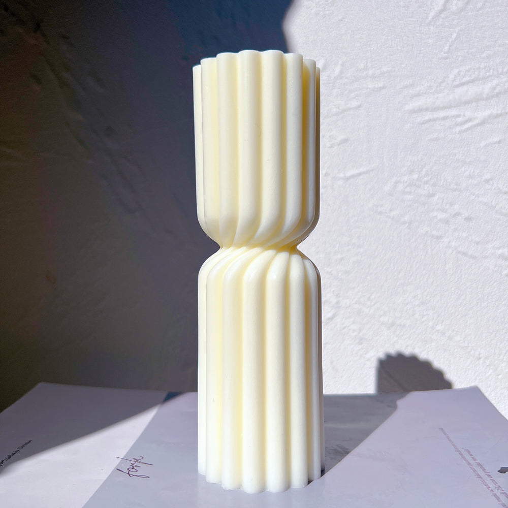 A detailed Twisted Hourglass Candle Moulds silicone candle mould by MYKA Candles and Moulds, perfect for candle making, soap moulds, and resin moulds.