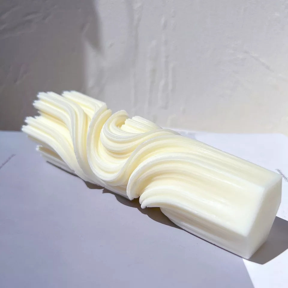 An intricate Abstract Pillar Candle Mould silicone candle mold by MYKA Candles and Moulds, designed for aesthetic candles and resin moulds.