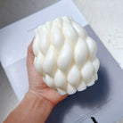 An aesthetic Braid Candle Mould silicone candle mould from MYKA Candles and Moulds, perfect for soap, resin, and cake mould art.