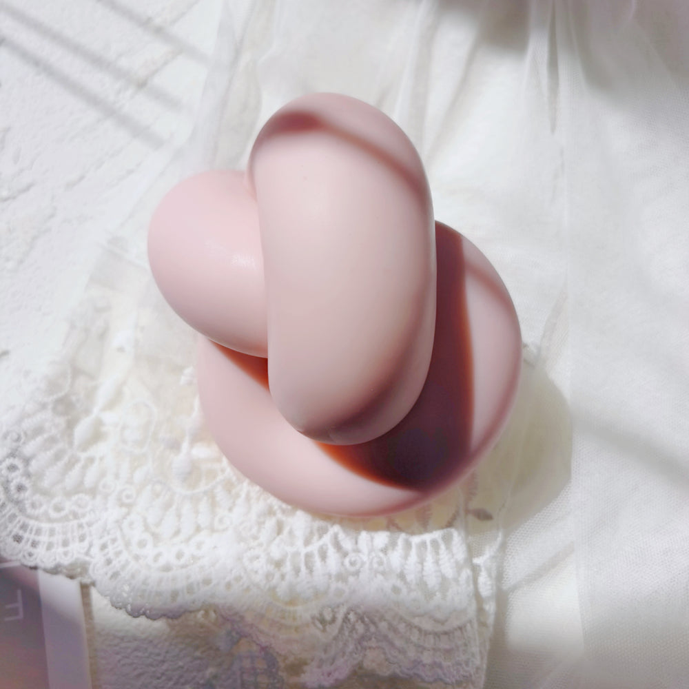 The Infinity Knot Candle Mould silicone candle mould by MYKA Candles and Moulds, a top choice for artistic resin moulds and baking moulds.