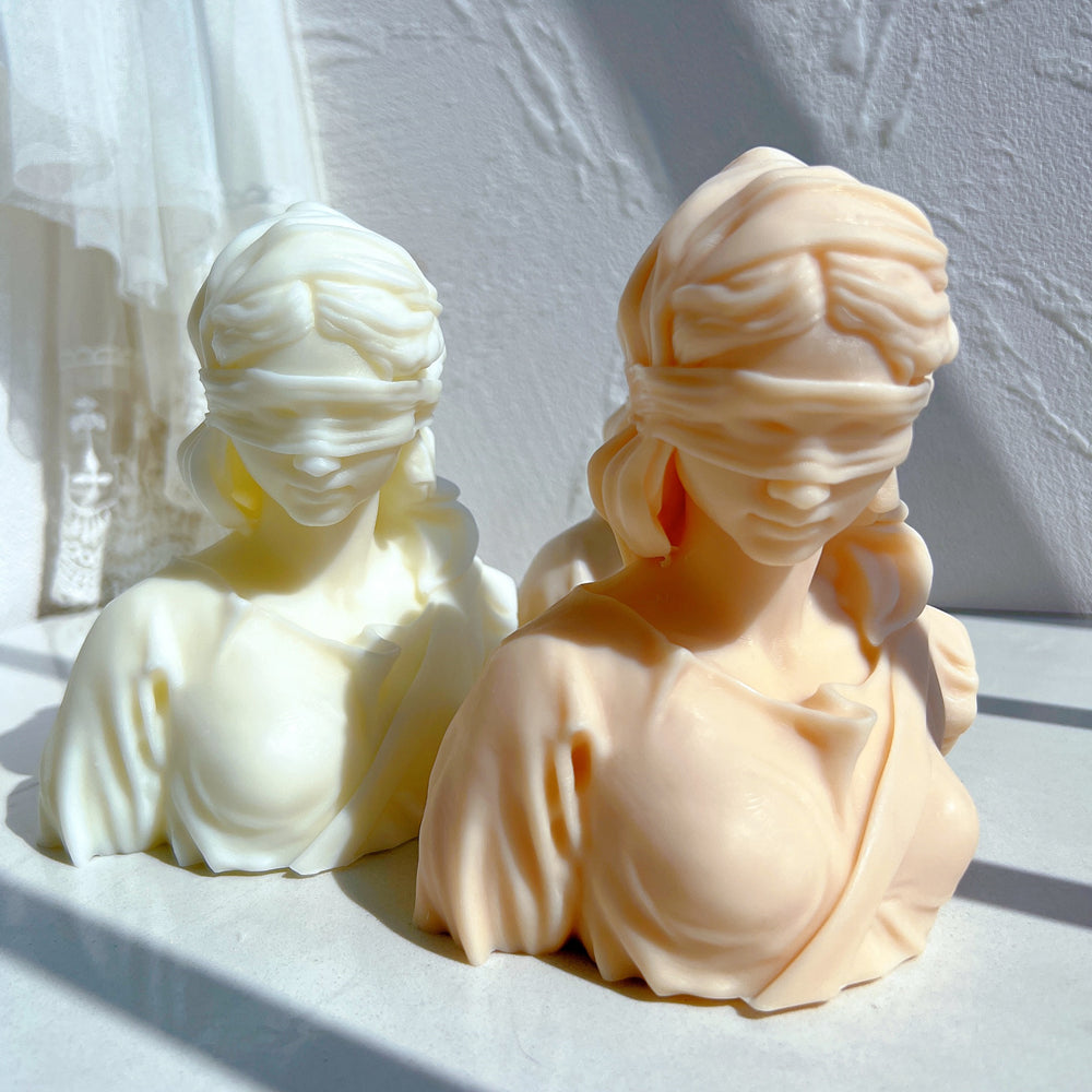 An aesthetic Lady Justice Candle Mould silicone candle mould from MYKA Candles and Moulds, perfect for soap, resin, and cake mould art.