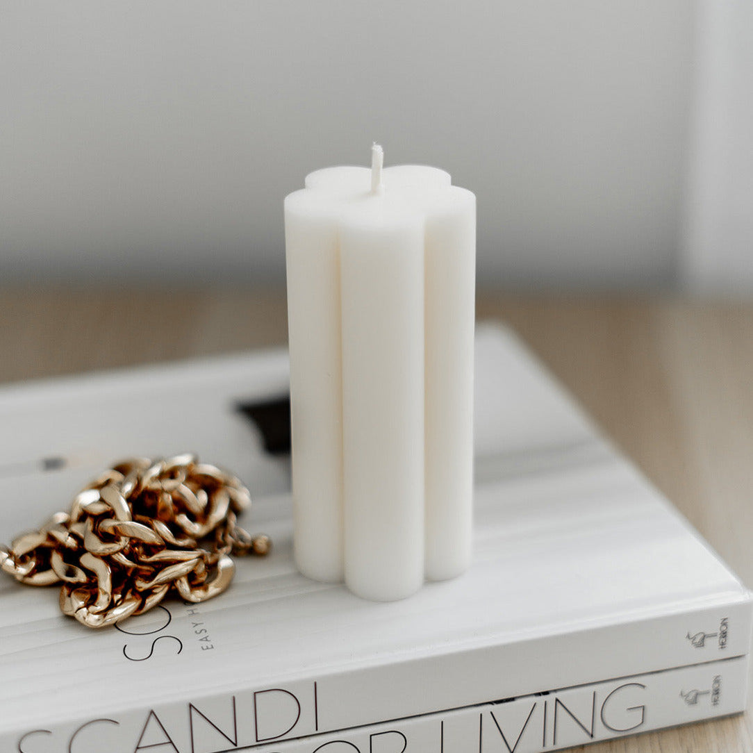 An intricate Multi-sized Blossom Pillar Candle Moulds silicone candle mold by MYKA Candles and Moulds, designed for aesthetic candles and resin moulds.