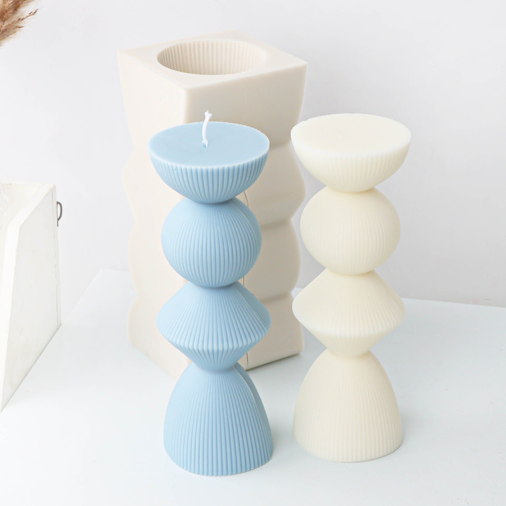 The Ribbed Geometric Pillar Candle Mould silicone candle mold by MYKA Candles and Moulds, featuring high detail for candle, soap, and baking moulds.