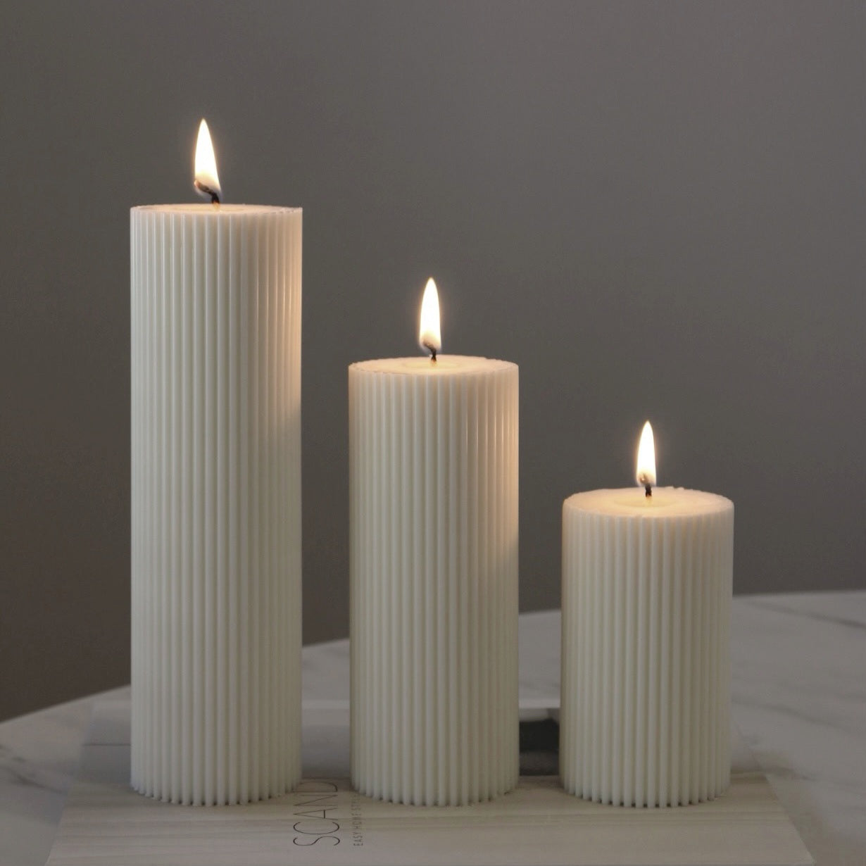 A high-performance Ribbed Pillar Candle Moulds silicone candle mold from MYKA Candles and Moulds for resin art and professional baking mould use.
