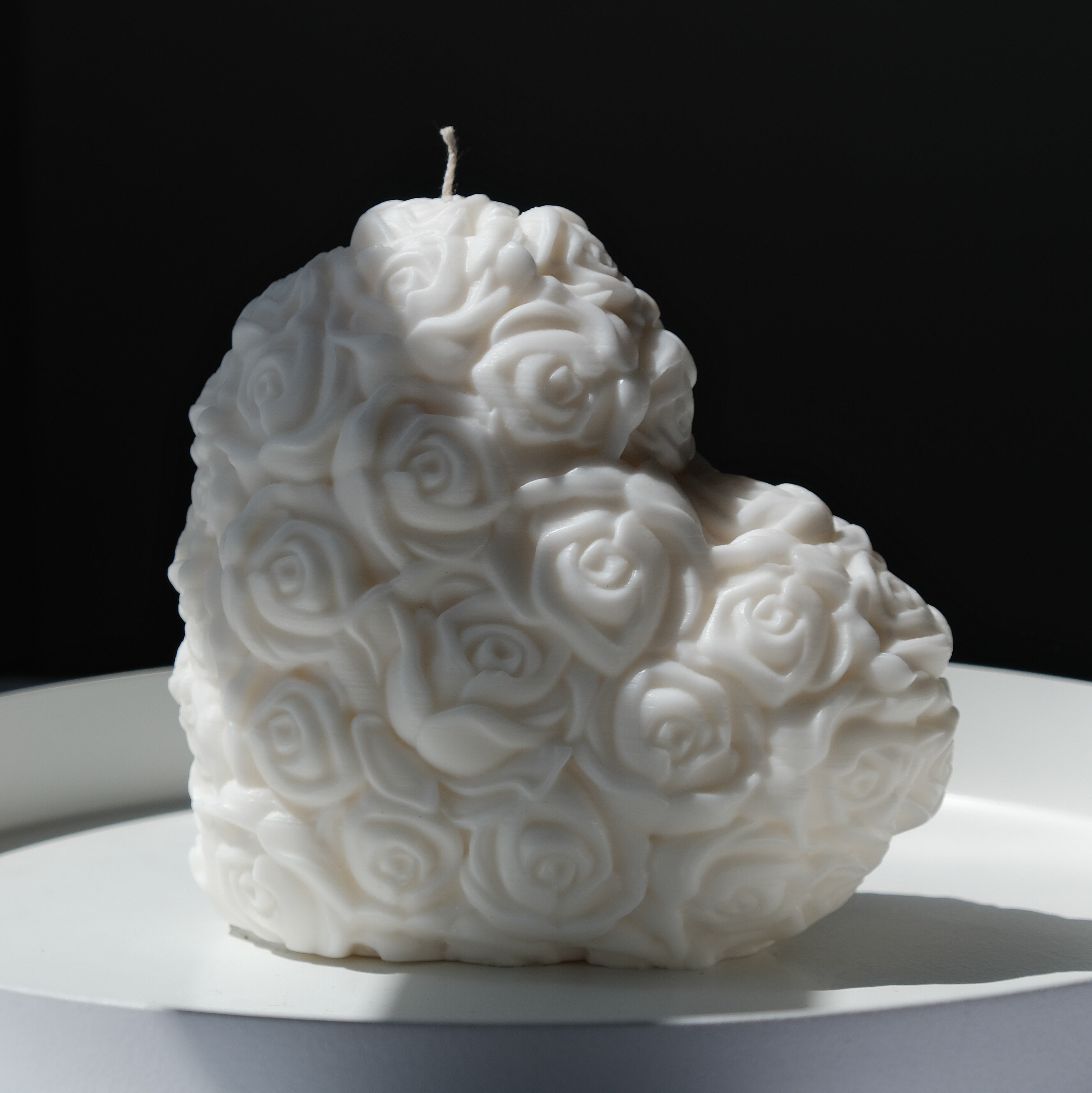 An aesthetic Rose Heart Candle Mould silicone candle mould from MYKA Candles and Moulds, perfect for soap, resin, and cake mould art.