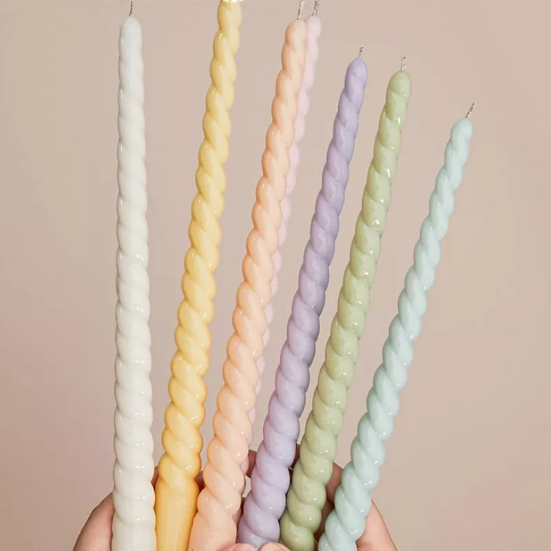 An intricate Tapered Twist Pillar Candle Mould silicone candle mold by MYKA Candles and Moulds, designed for aesthetic candles and resin moulds.