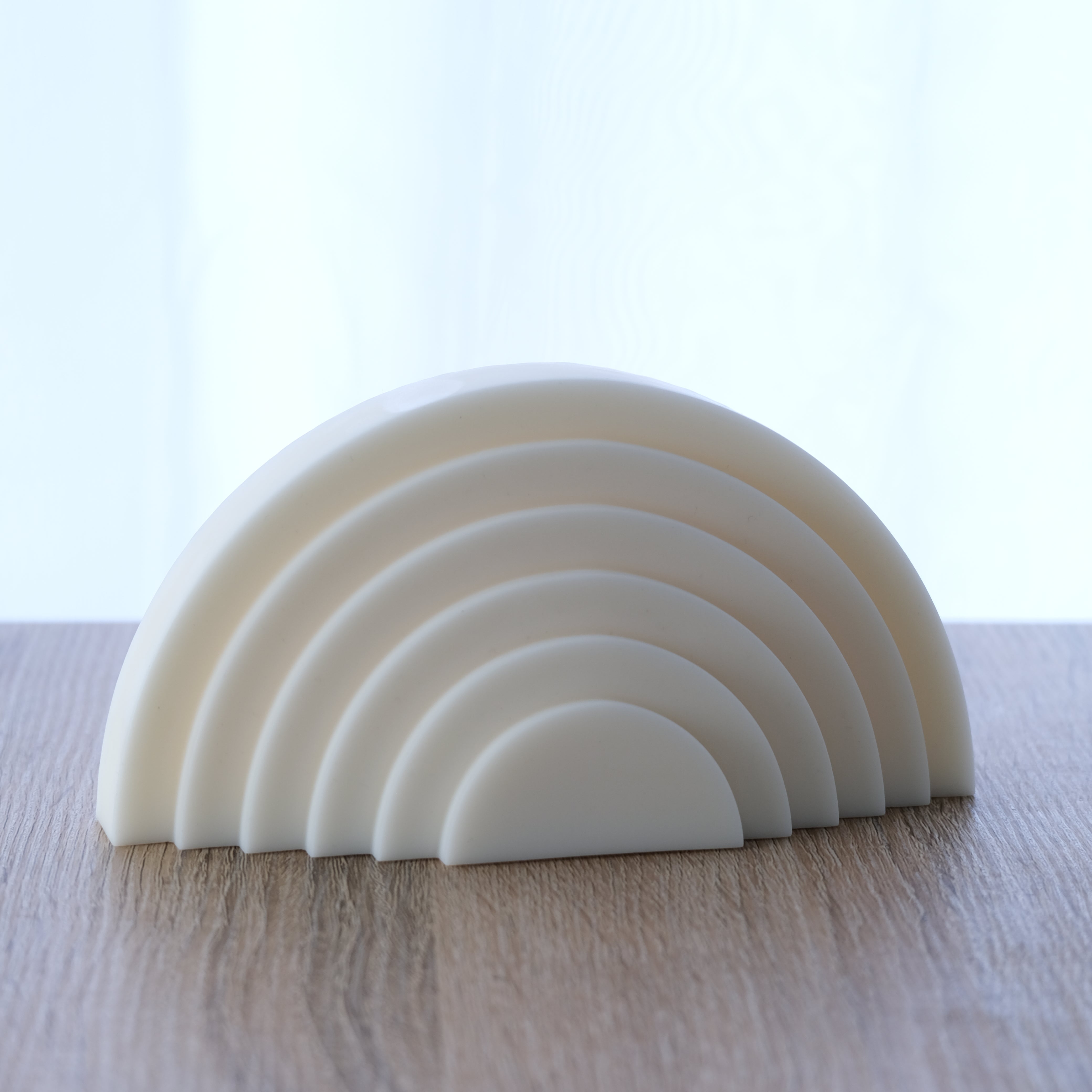 A high-performance Tiered Rainbow Candle Mould silicone candle mold from MYKA Candles and Moulds for resin art and professional baking mould use.