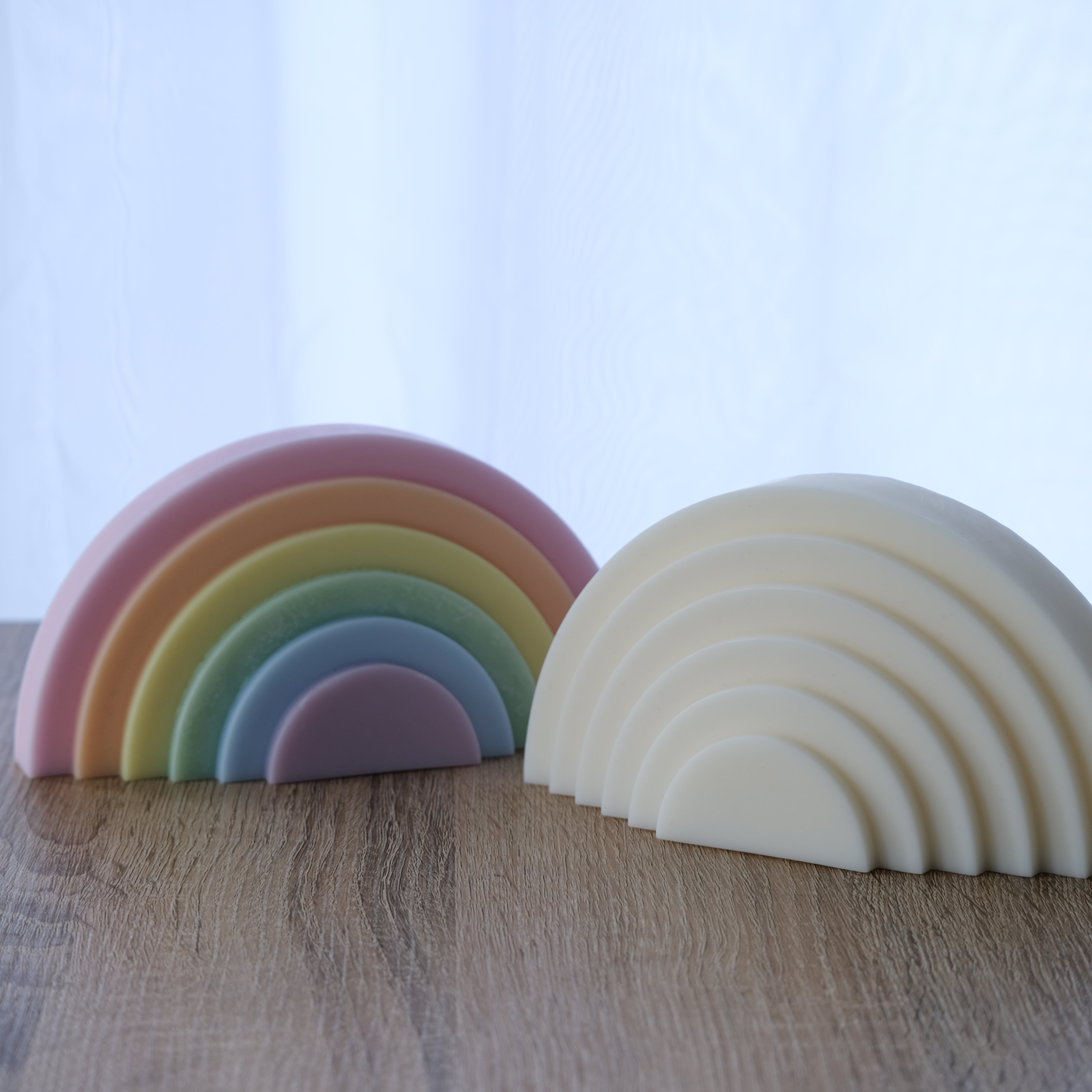A Tiered Rainbow Candle Mould silicone candle mold by MYKA Candles and Moulds, the perfect multipurpose tool for soap, resin, and cake mould casting.