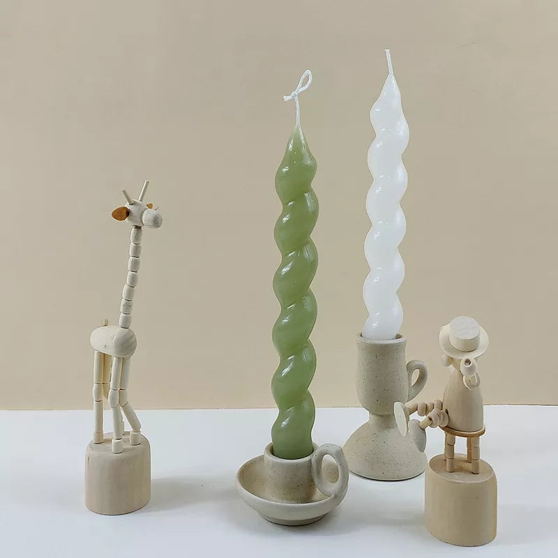 Crafting with the Twisted Pillar Candle Mould silicone candle mould by MYKA Candles and Moulds, also used for soap, resin, and cake moulds.